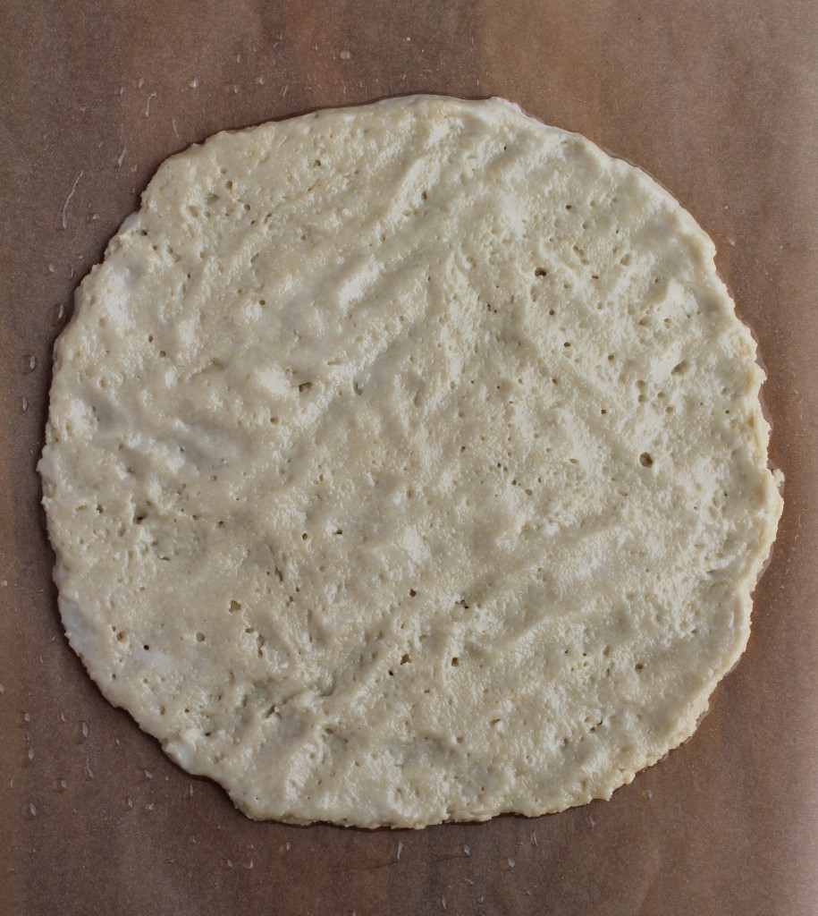 Be gentle when flattening out the dough; it will have a lot of air and will easily separate. Make sure your hands are well oiled. 