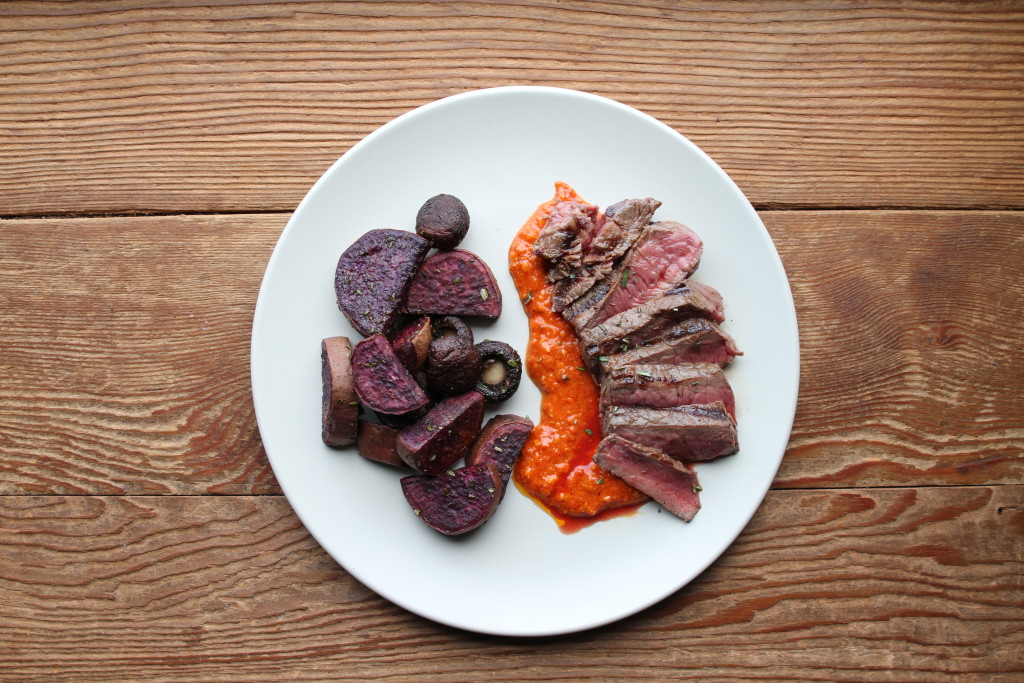 Steak with roasted pepper sauce & purple sweet potatoes 