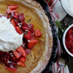 dutch baby with strawberries and cream